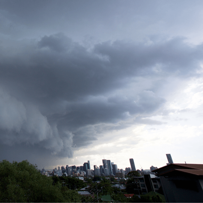 Dark storm clouds over Sydney city skyline
